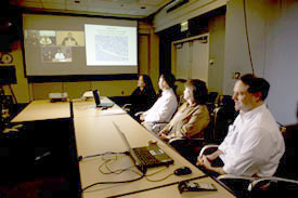 doctors at board table