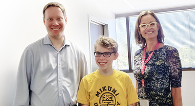 Pediatric neurology patient James with his pediatric neurosurgeons