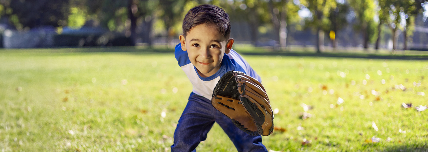 Neonatology patient Alfredo playing baseball