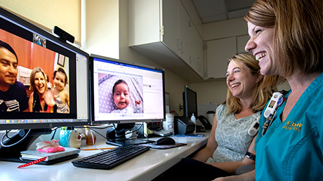 Nurse and expert conducting a telehealth appointment