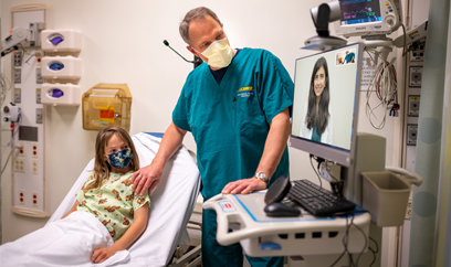 James Marcin conducting a telehealth visit. (c) UC Davis Regents. All rights reserved.