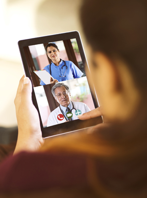 Telehealth visit with two providers (c) UC Regents. All rights reserved.