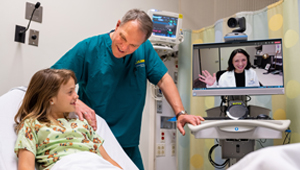 James Marcin conducting telehealth visit. (c) UC Davis Regents. All rights reserved.