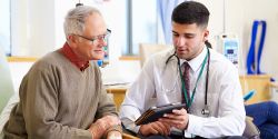 Doctor talking with a patient (c) UC Regents. All rights reserved.