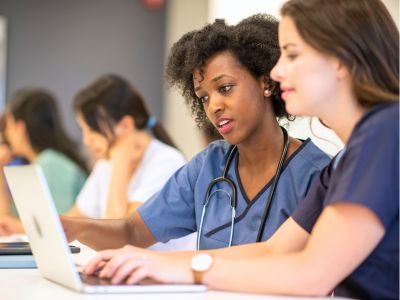 Medical students at a computer (c) UC Regents. All rights reserved.
