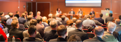 People attending a presentation (c) UC Regents. All rights reserved.