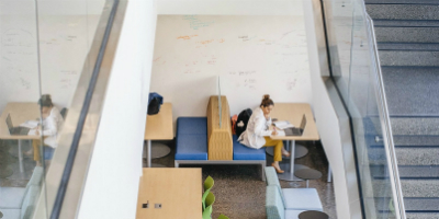 Student sitting at a table studying by themself