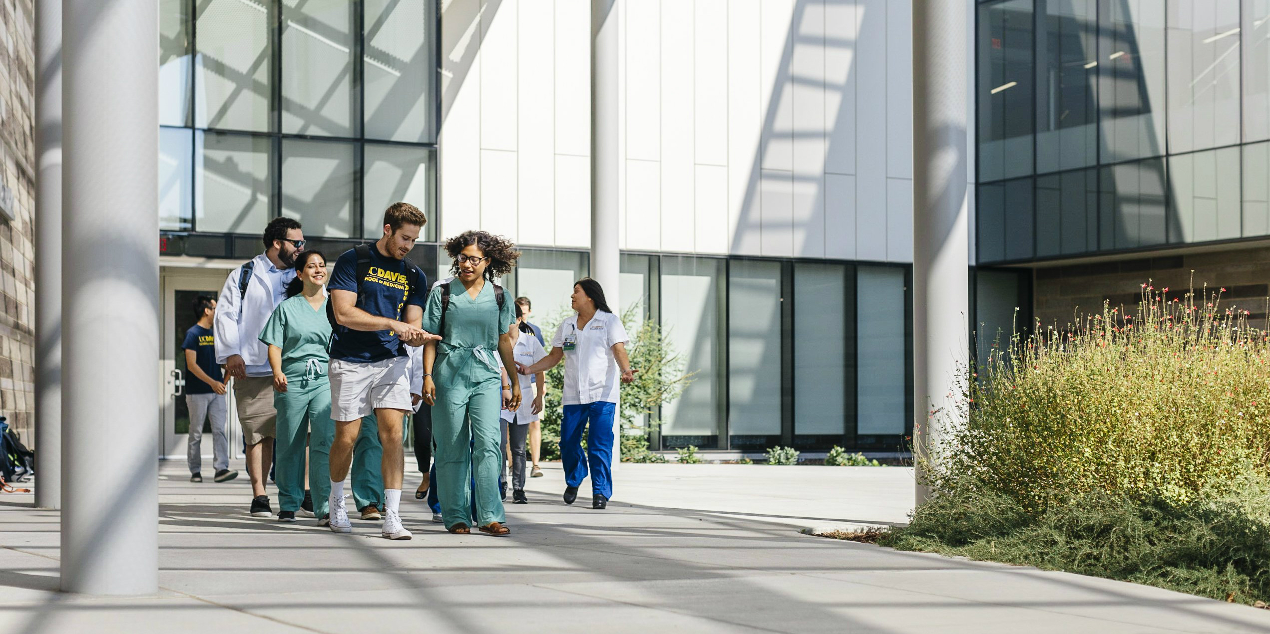 Students walking and talking with each other