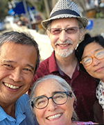 Stephanie Shaner (class of 1986) in striped shirt, Malcolm Shaner (class of 1981) with hat, Angeli Agatep (class of 1986) with yellow glasses, Anastasia Pappas (class of 1990) with dark glasses.