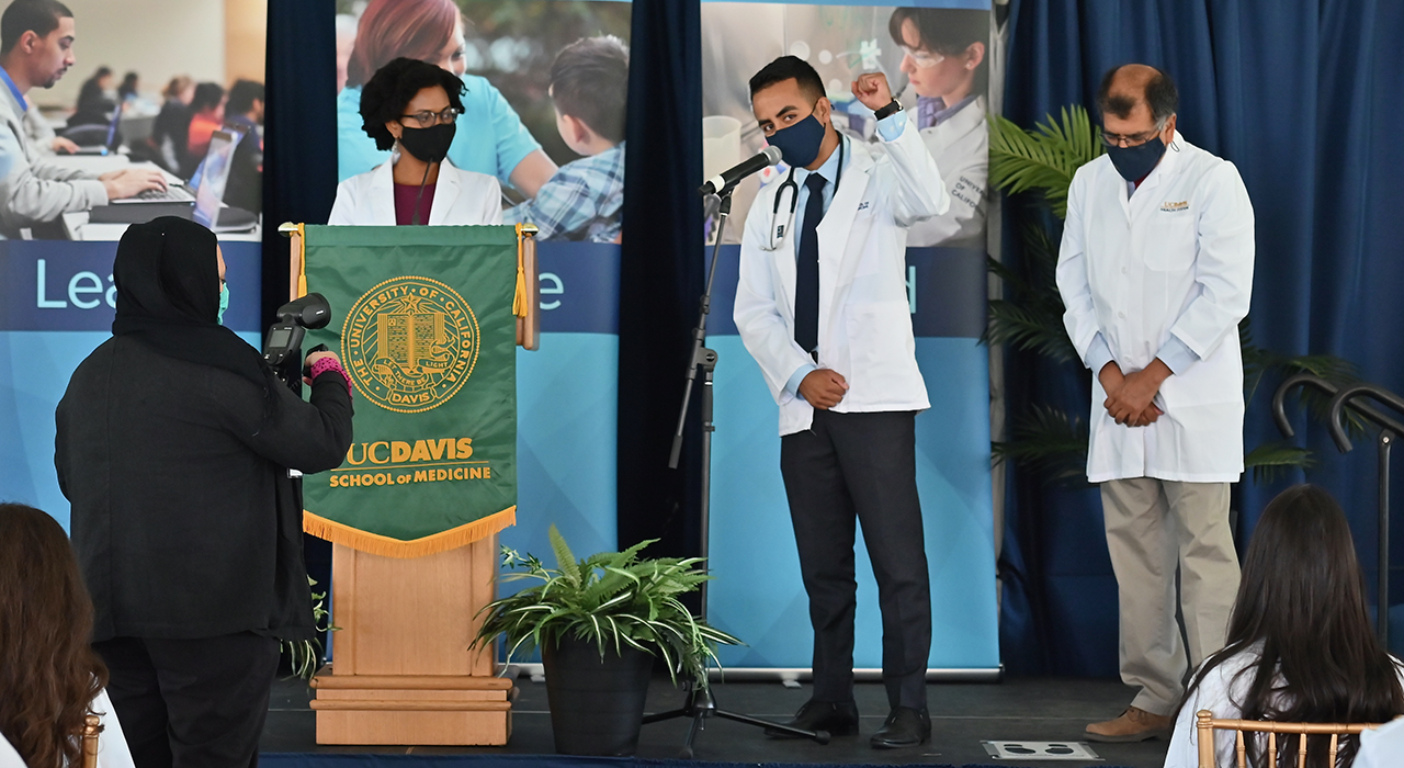 New medical student Alex Villegas thanks his parents for their support during the induction ceremony