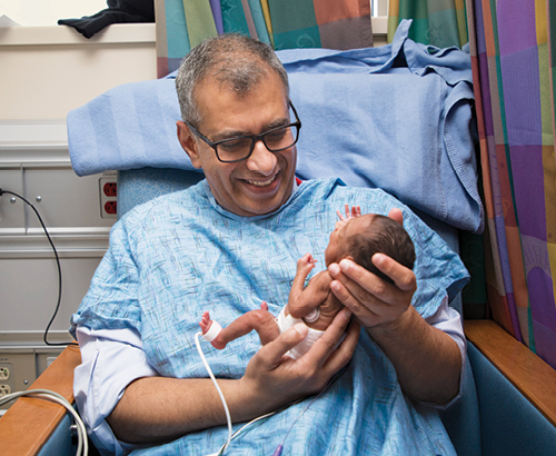 Lakshminrusimha with newborn patient