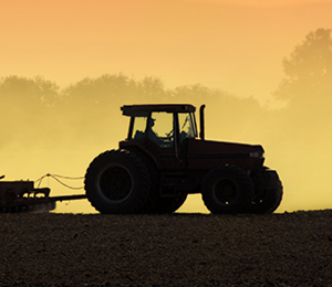 Tractor plowing a field