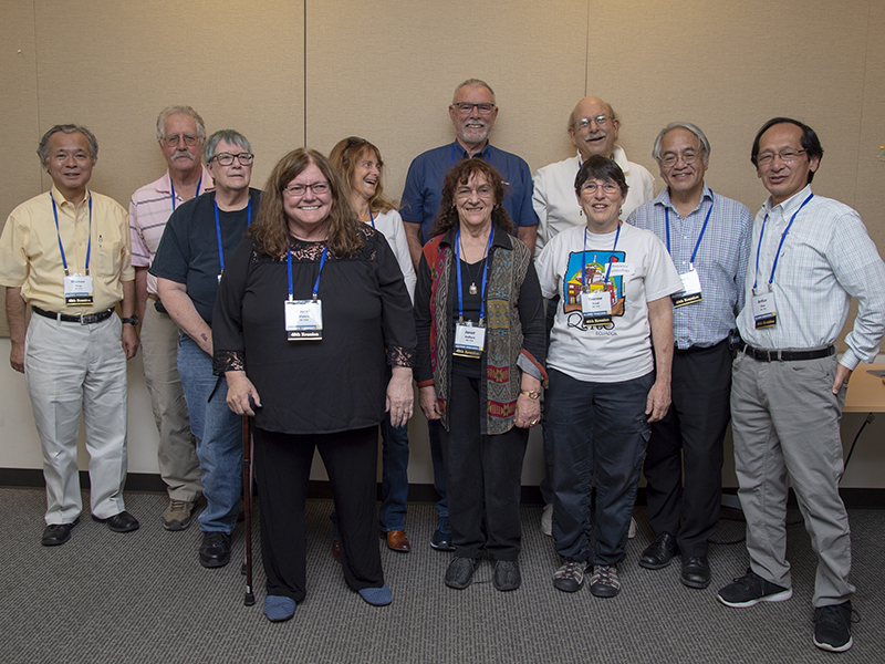 Members of the Class of 1976 reminiscing at their reunion class catch-up session. Reunion rooms included screens and laptops for photo sharing.