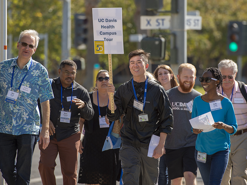 Alumni take a walking tour of UC Davis Health’s growing Sacramento campus. UC Davis’ new Aggie Square technology and innovation hub project is planned for a portion.