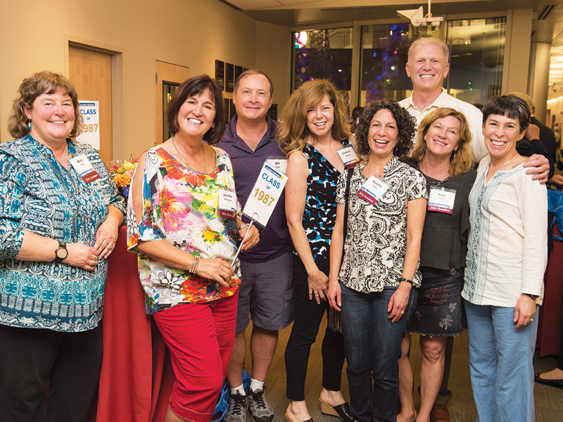 Members of the Class of 1987 reminiscing at their Friday afternoon reunion class catch-up session. Reunion rooms included screens and laptops for photo sharing.