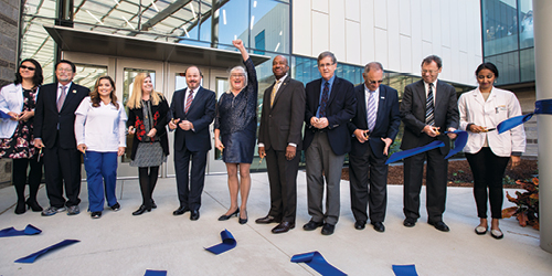 Group standing together after ribbon cutting ceremony