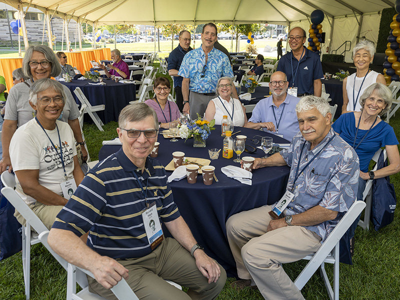 Members of the Class of 1984 and friends enjoy breakfast in the company of their former classmates and friends.