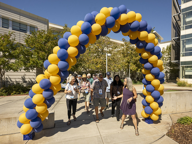 Alumni head out to tour the Sacramento campus.