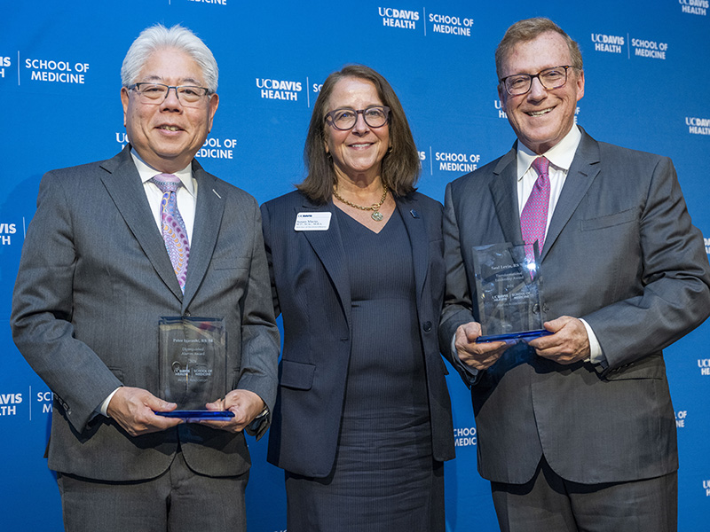 Susan Murin (M.D., M.Sc., M.B.A.), with 2024 UC Davis School of Medicine Alumni Award recipients Peter Igarashi (R.S. ’84, left), and Saul Levin (R.S. ’89, right) at Alumni Weekend 2024. Fellow awardee Dr. Sophia Fang could not join in person and accepted via video.