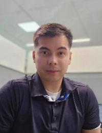 Student in professional photo smiling.