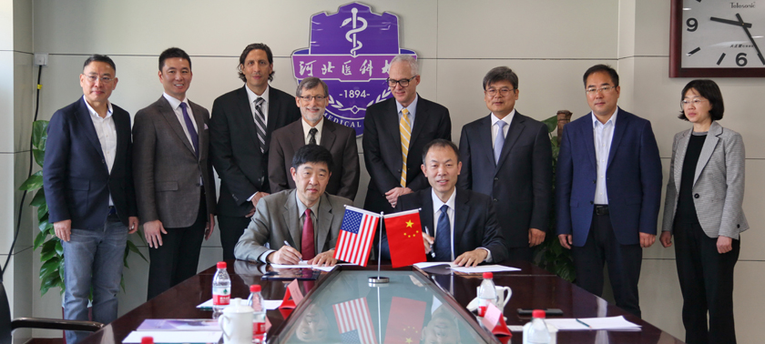 UC Davis Health physicians sign an agreement with representatives from Hebei Medical University in China. (c) UC Davis Health. All rights reserved.