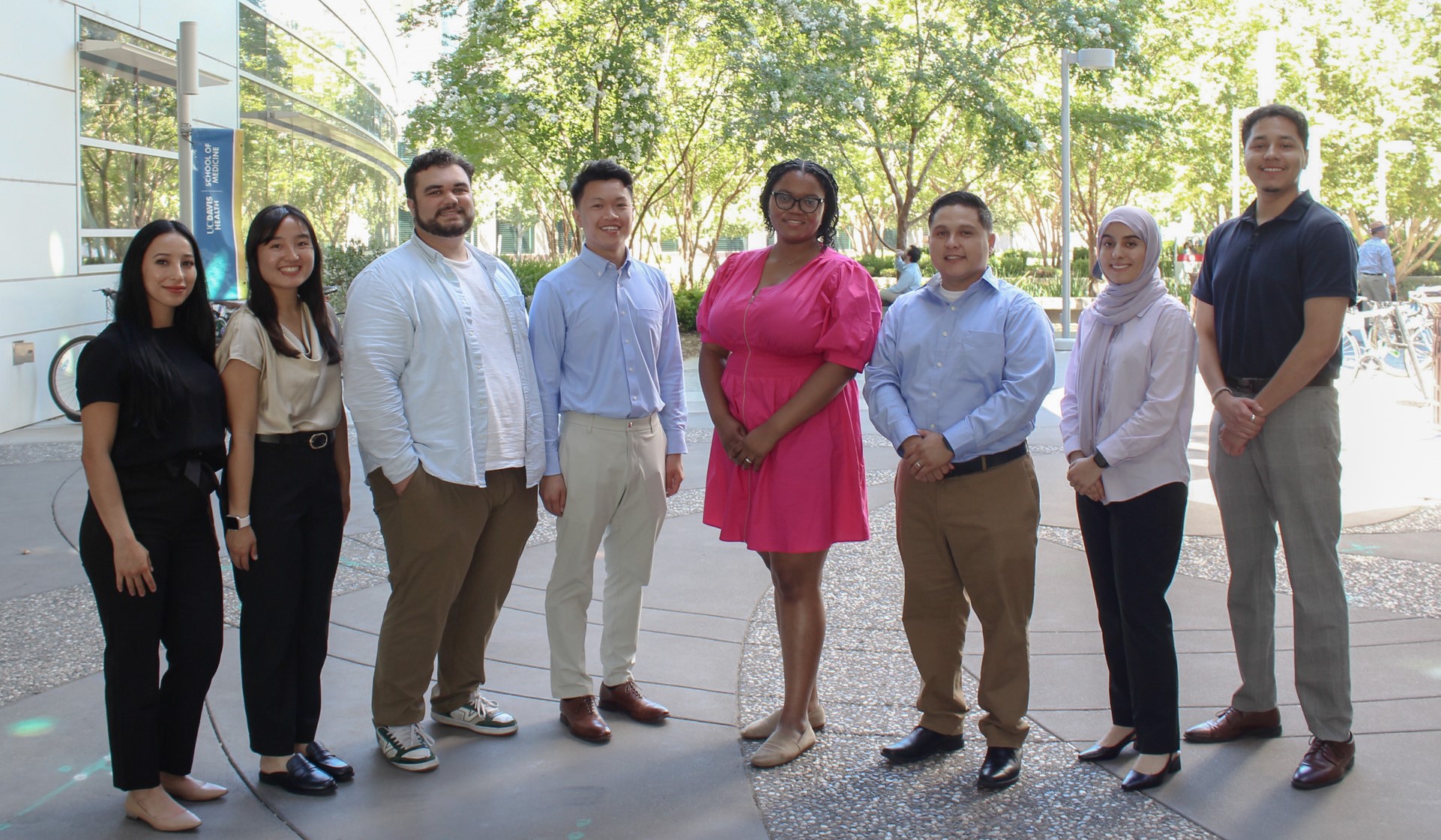 8 students standing together