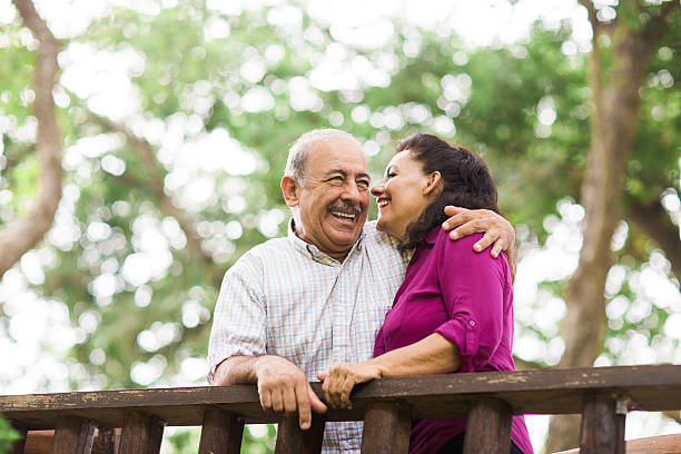 Elderly couple embracing