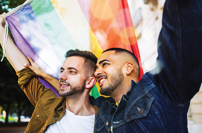 two persons at pride event