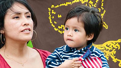 immigrant woman with child, stock