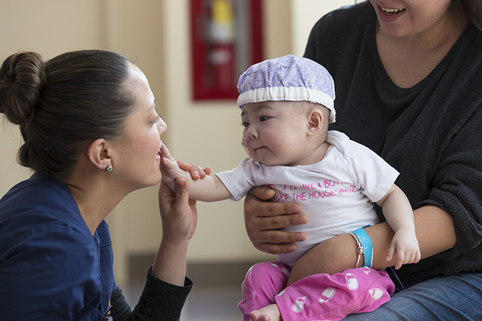 Nurse with PICU patient