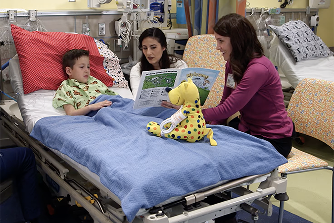 Healthcare worker working with child patient