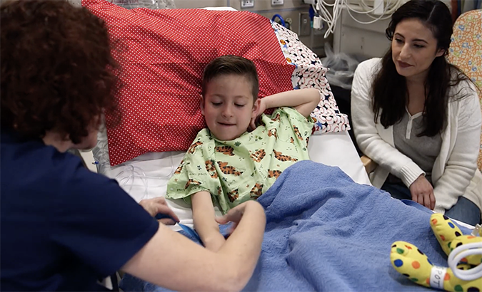 Nurse making patient comfortable