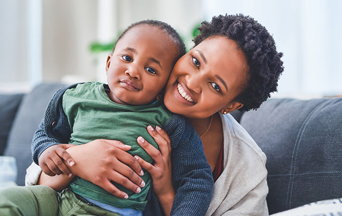 Woman holding a toddler