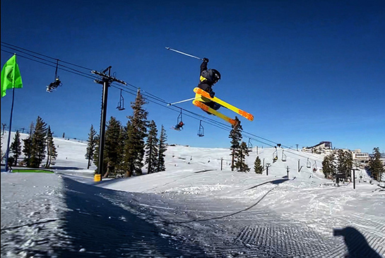 Child skiing and catching air