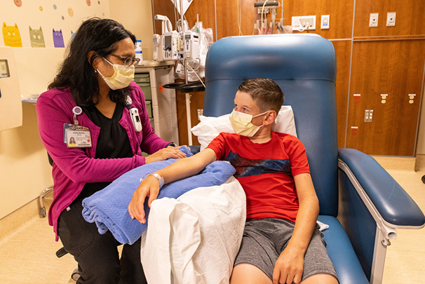 health care worker supporting child patient