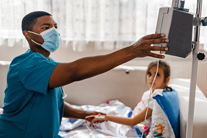 Home care nurse helping a patient.