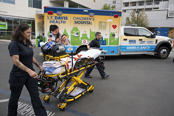 Emergency workers using child friendly ambulance