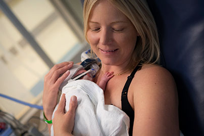 Mom with baby, breastfeeding