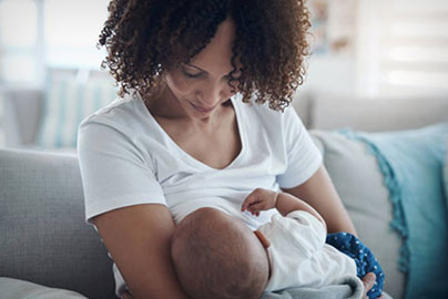 Mom breastfeeding baby