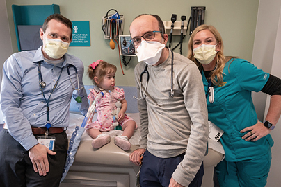 Patient Everly Jacobsen with members of the pediatric hypertension team: Brian Goudy, Rory Kamerman-Krezmer and nurse practitioner Callie Brecek.