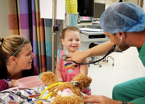 Child holding a balloon