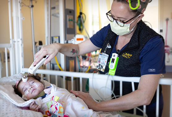 PICU nurse with infant