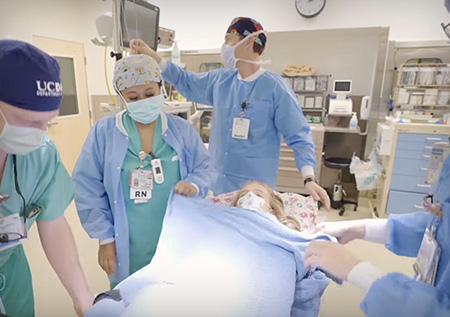 Surgical team with patient in the surgery room