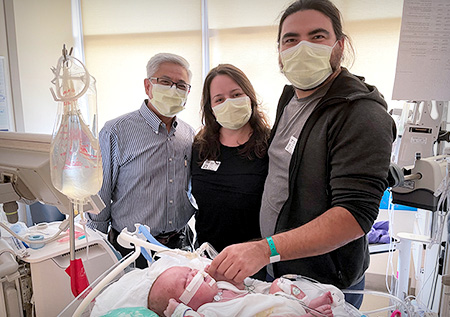 Frank Ing with baby Mateo and his parents.