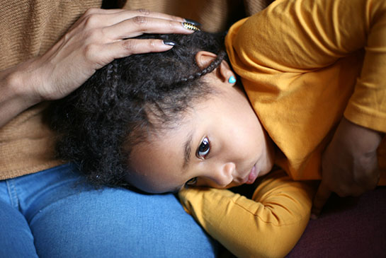 Mom comforting child