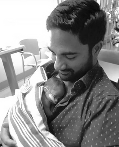 Dad and baby kangaroo care