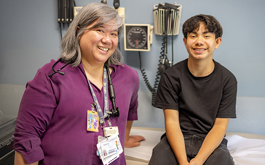 Dr. Stephanie Nguyen with pediatric nephrology patient Justin