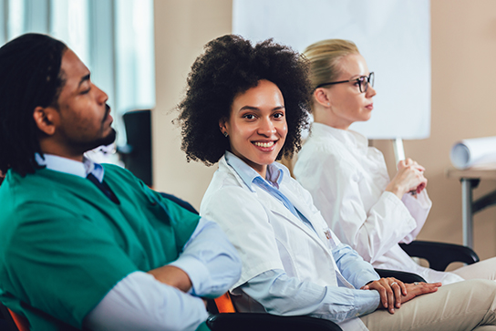 Doctors in classroom (C) Adobe stock. All rights reserved.