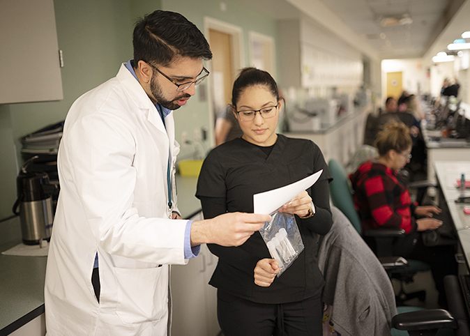 Dr. Mustafa Ansari, a UC Davis Health neurologist, discusses the handling of patient samples.