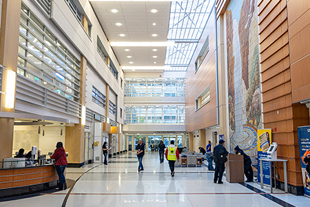 A large hallway with people in the main hospital.